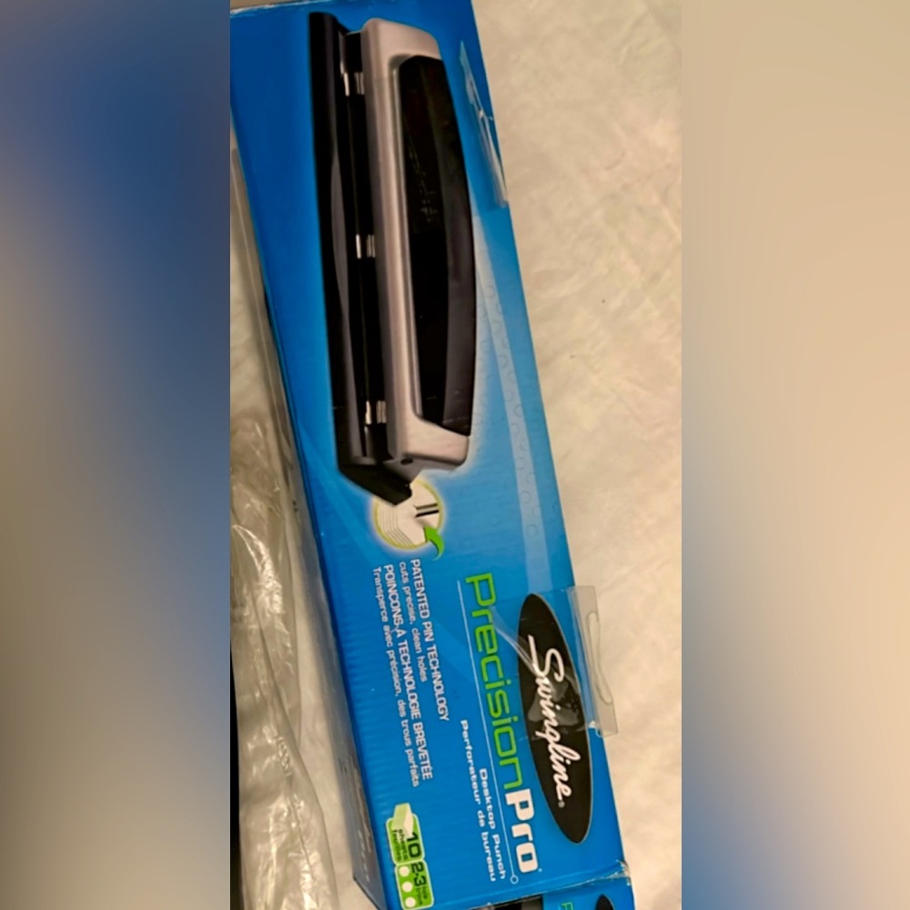 New in box paper punch